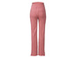 Pantalon en maille rose avec taille élastique.