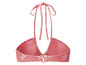 Un haut de bikini rose avec le logo 'Sansibar'.