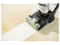 Bissell nettoie un tapis avec sa machine à laver PowerWash.