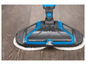 Bissell SpinWave vloerreiniger met draaiende pads op een houten vloer.