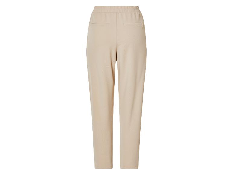 Beige broek met elastische tailleband.