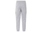 Grijze joggingbroek met zwarte zijstrepen.