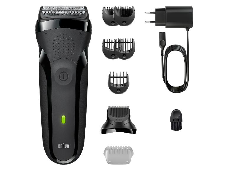 Kit de rasage Braun avec rasoir électrique, accessoires de peigne, chargeur et brosse de nettoyage.