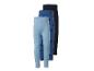 Trois leggings pour filles dans des tons bleus, un avec des cœurs, sur fond blanc.