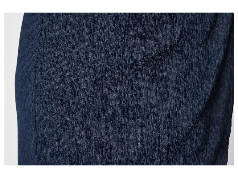 Close-up van een donkerblauwe geweven stof.