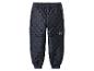 Pantalon matelassé bleu marine avec taille élastique et poignets côtelés.