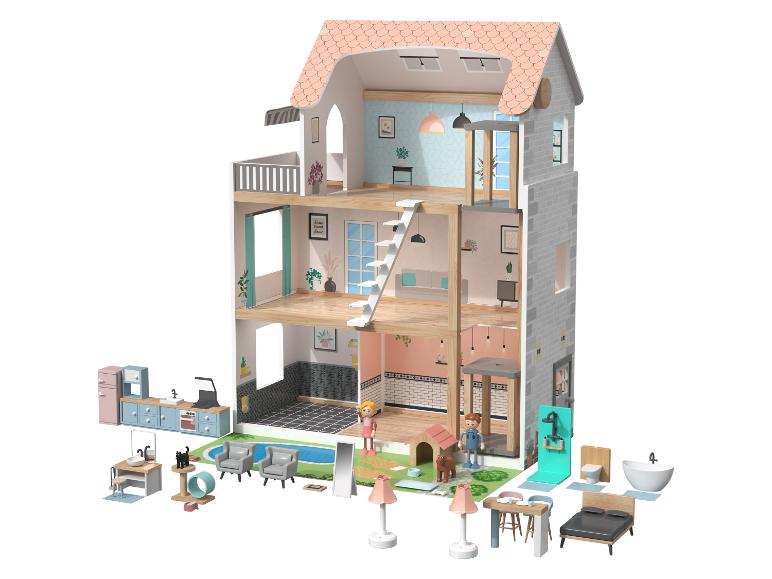 Une maison de poupée à trois étages avec un assortiment de meubles et de figurines.