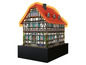 Un puzzle 3D d'une maison traditionnelle allemande à colombage.