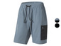 Blauwe sportbroek met zwarte details en een zak.