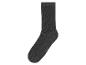 Une chaussette côtelée gris foncé avec la taille 35-38