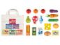 Sac de courses en toile avec des aliments jouets en bois.