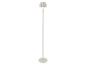 Lampadaire blanc avec un abat-jour plissé et une lumière chaude