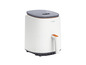 Une friteuse à air Cosori blanche avec un écran digital.