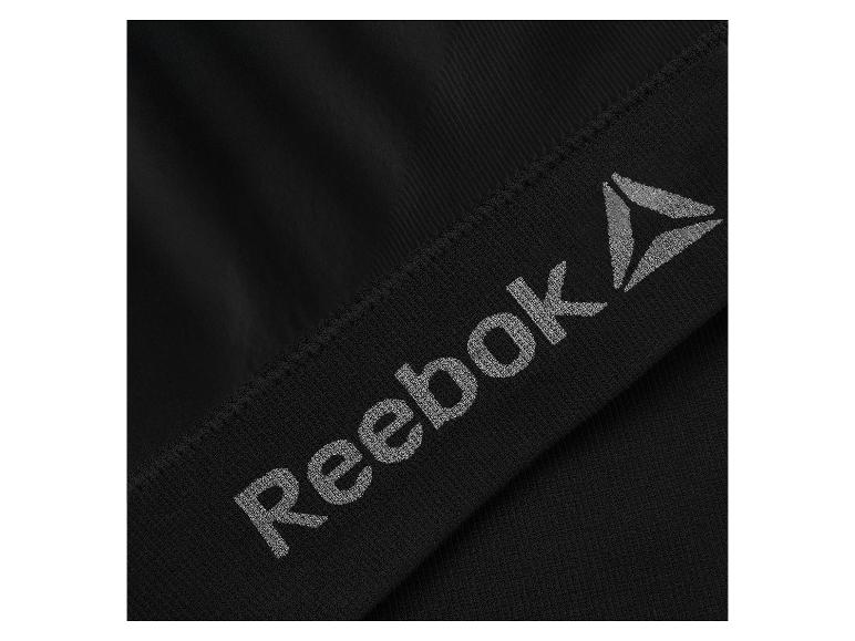 Vêtement de sport noir avec un détail de logo.