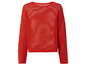 Een rood gebreid trui met lange mouwen.