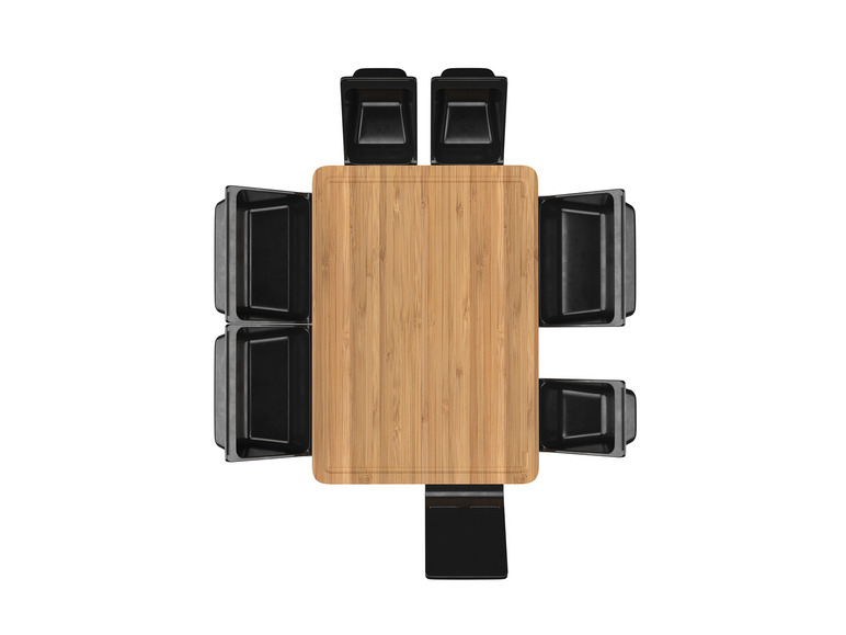 Een houten tafel met zes zwarte stoelen, gezien vanuit een vogelperspectief.