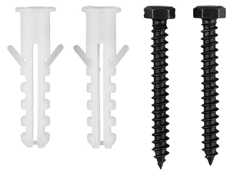 Twee witte pluggen en twee zwarte schroeven op een witte achtergrond