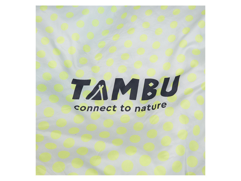 Tambu-stof met gele stippen en de tekst 'connect to nature'.