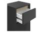 Zwarte kast met een open lade met wit interieur en licht hout.