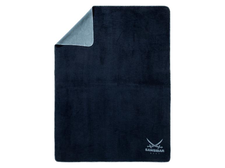 Een donkerblauwe handdoek van Sansibar Sylt.