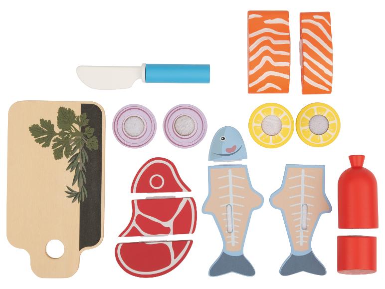 Ensemble de jouets alimentaires en bois, comprenant de la viande, du poisson, des légumes et des ustensiles de cuisine.