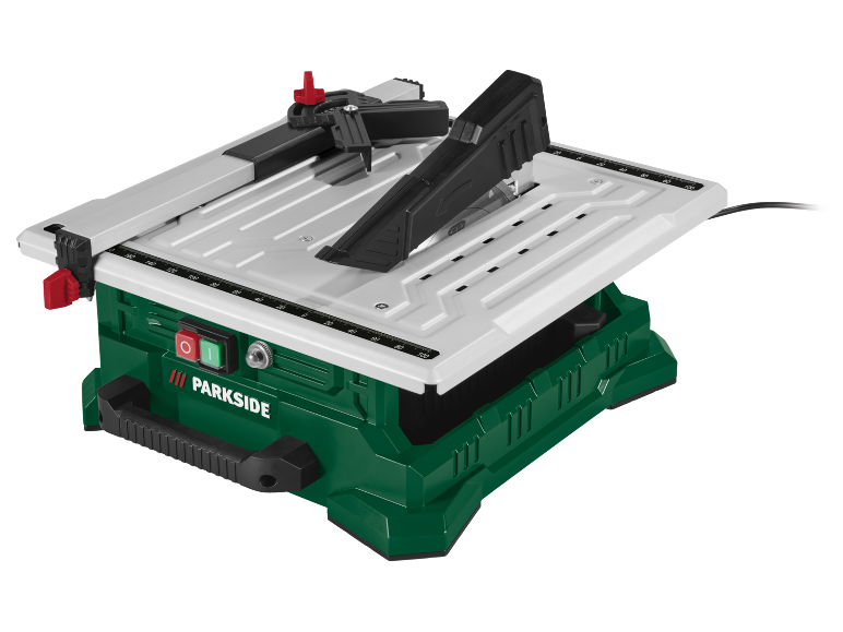 Tafelzaag met groene basis, wit werkblad en zwart zaagblad.