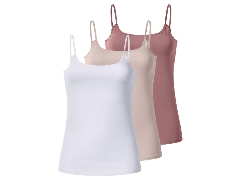 Set van drie dameshemdjes met spaghettibandjes in wit, beige en roze.