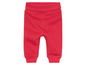 Pantalon de jogging rouge pour bébé.