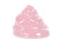 Une pâte gluante rose et pailletée sur fond blanc.