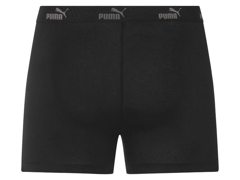 Shorts de sport noirs Puma : ceinture élastique avec logo.