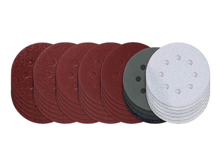 Assortiment ronde schuurschijven in diverse korrels en kleuren, waaronder rood, grijs en wit.