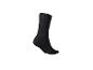 Une seule chaussette noire sur fond blanc.