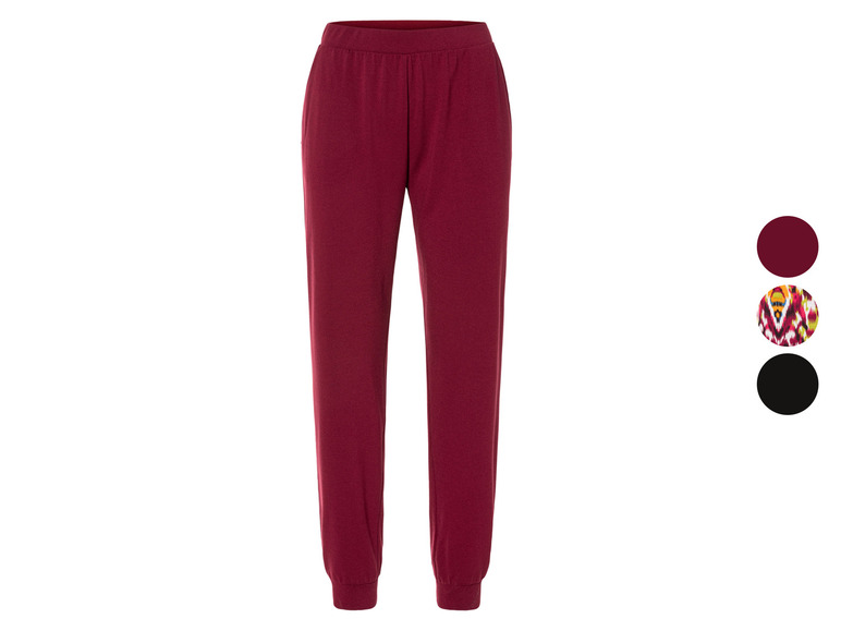 Bordeauxrode joggingbroek met elastische tailleband.