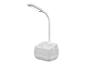Lampe de table blanche avec support pour téléphone.