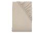 Drap-housse beige en jersey.