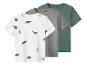 Drie kinder T-shirts met korte mouwen: één wit met groene dinosaurussen, één grijs en één groen.