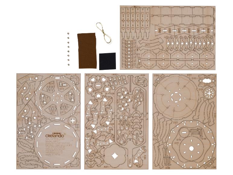 Kit de construction en bois Crelado avec pièces découpées au laser, accessoires et instructions.