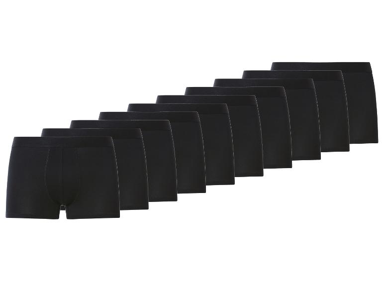 Tien zwarte herenboxershorts op een rij