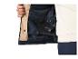 Veste beige et marine avec doublure intérieure, portée par une personne.
