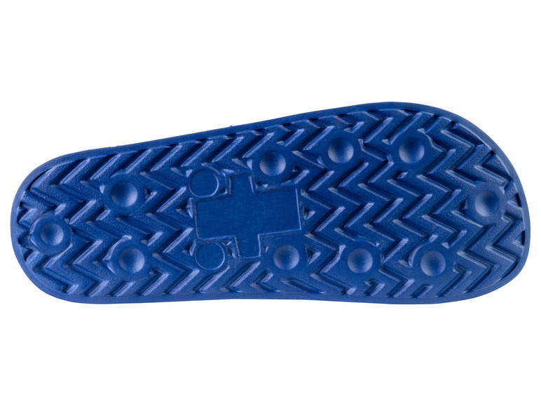 Semelle bleue d'une tong avec un motif en zigzag.