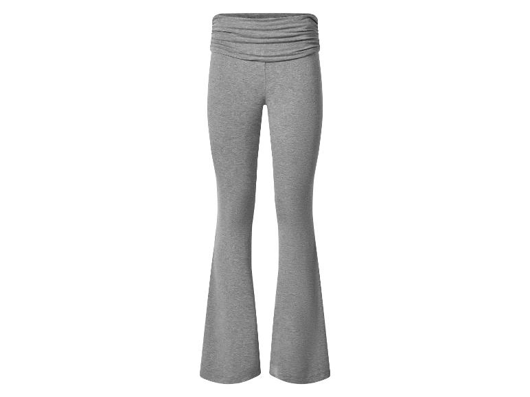 Pantalon de jogging gris avec jambes évasées et taille froncée.