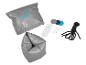 Crivit opblaasbaar luchtbed en accessoires: grijs luchtbed, pomp, reparatieset en touw.