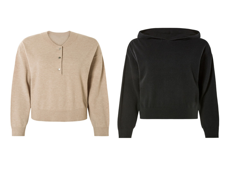 Beige trui met knopen en zwarte hoodie.
