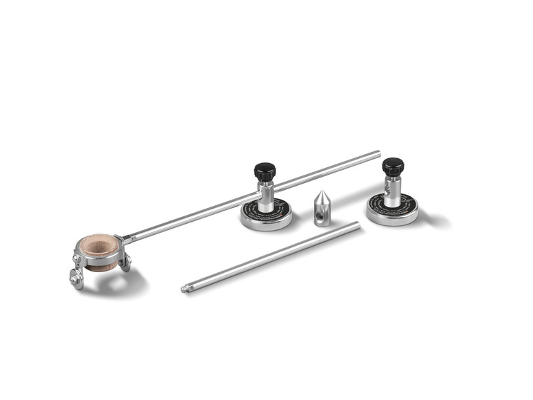 Twee magnetische cirkelmaten en een houder voor een cirkelmal.