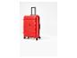 Valise rigide rouge Esmara avec poignée télescopique et quatre roulettes.