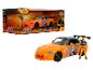 Une voiture jouet Honda S2000 orange sur le thème de Naruto et une figurine de Naruto.