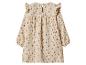 Beige kinderjurk met lange mouwen, ruches en een klein bloemenpatroon.