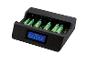 Chargeur de piles TRONIC avec six piles AA en charge, affichant l'état de charge.