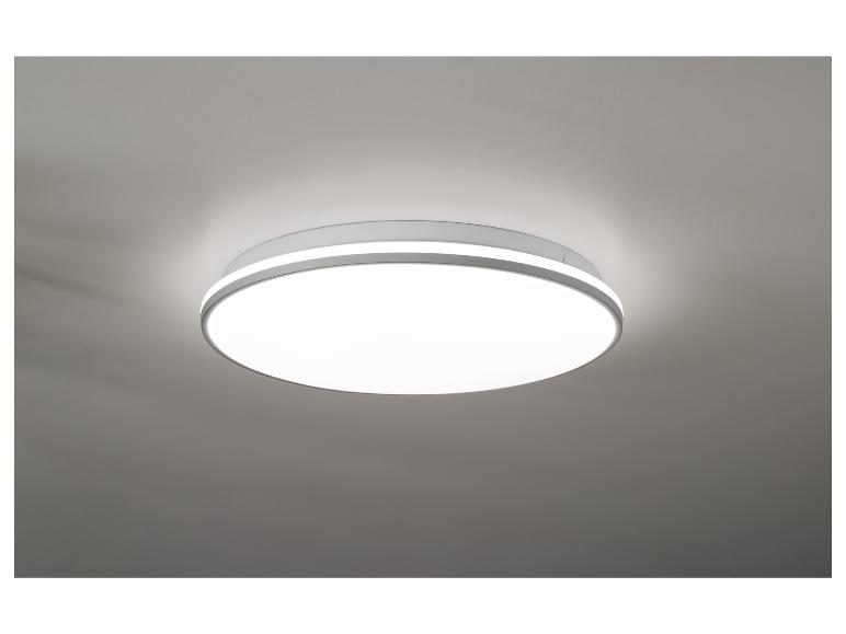 Een ronde plafondlamp met een witte afwerking.