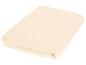 Couverture polaire pliée de couleur crème
